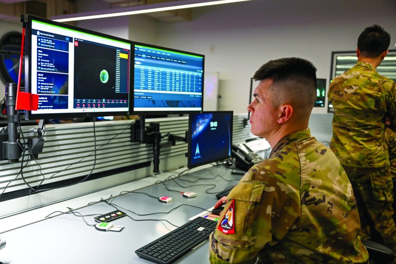 A member of the 18th Space Defense Combat Squadron of the U.S. Space Force observes orbital data at Vandenberg Space Force Base, California. Credit: U.S. Space Command